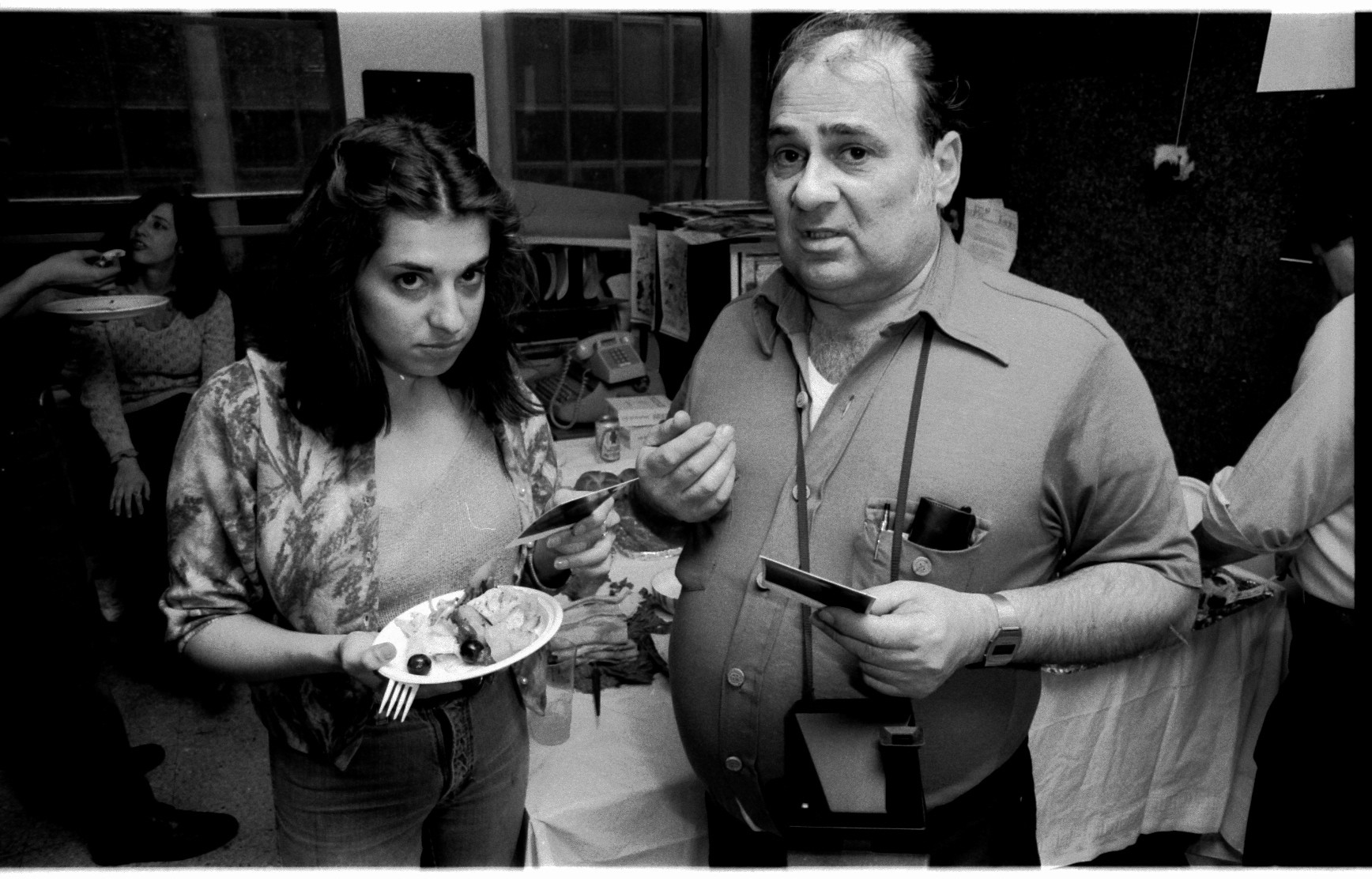 Annie Nocenti, choking down some Bullpen cake and Danny Crespi looks concerned.