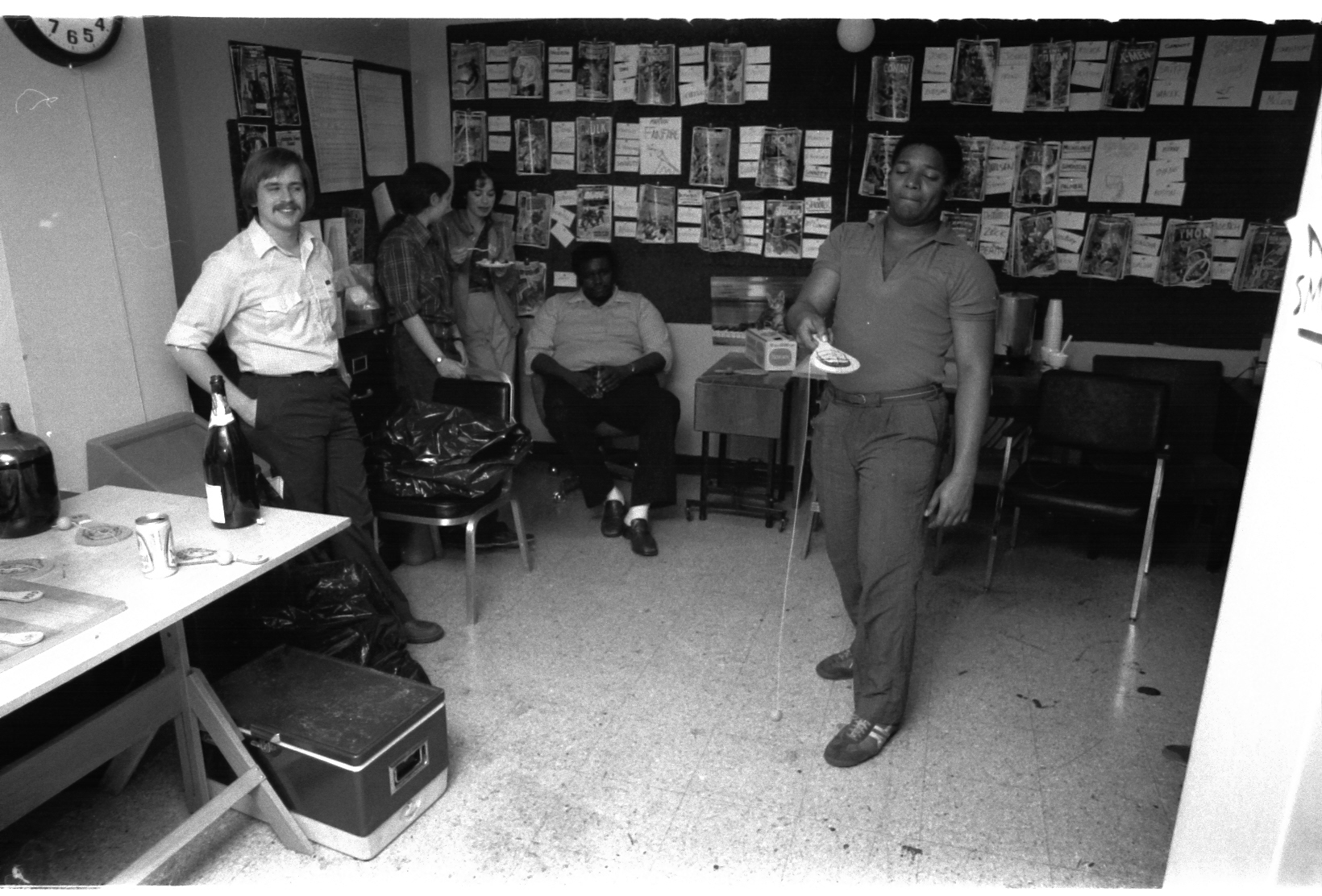 Lance Tooks, still Too Busy Looking Good! In the background, Mark Gruenwald's wife Belinda, has joined in the fun and is taking in some free cake! Paul Becton reclines.