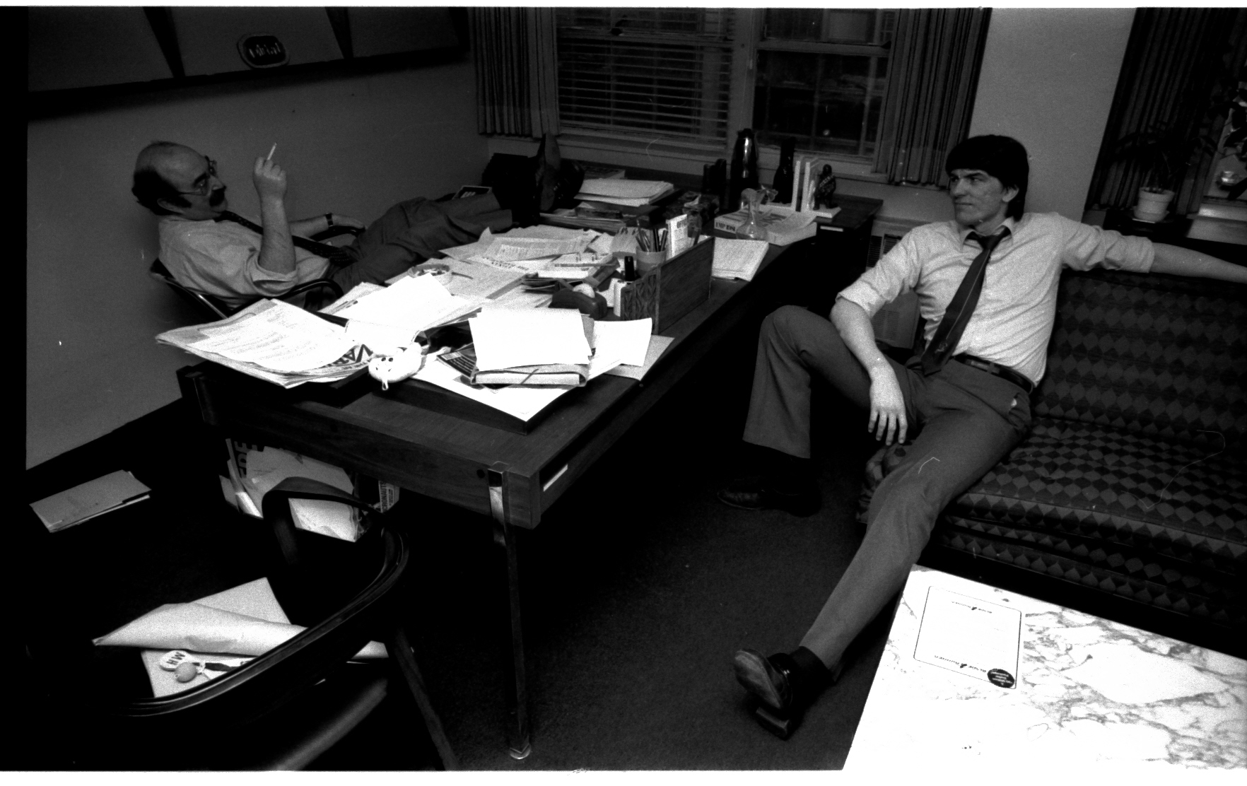 The calm after the storm. A peaceful moment between Mike Hobson and Jim Shooter in Mike's spacious corner office. That damned couch has been at Marvel since I was a downy-cheeked messenger boy-- turning up in Stan's offices like a bad penny, year in, year out. Mike must've lost a bet to have gotten that couch. I'm pretty sure it did not survive the trip downtown...