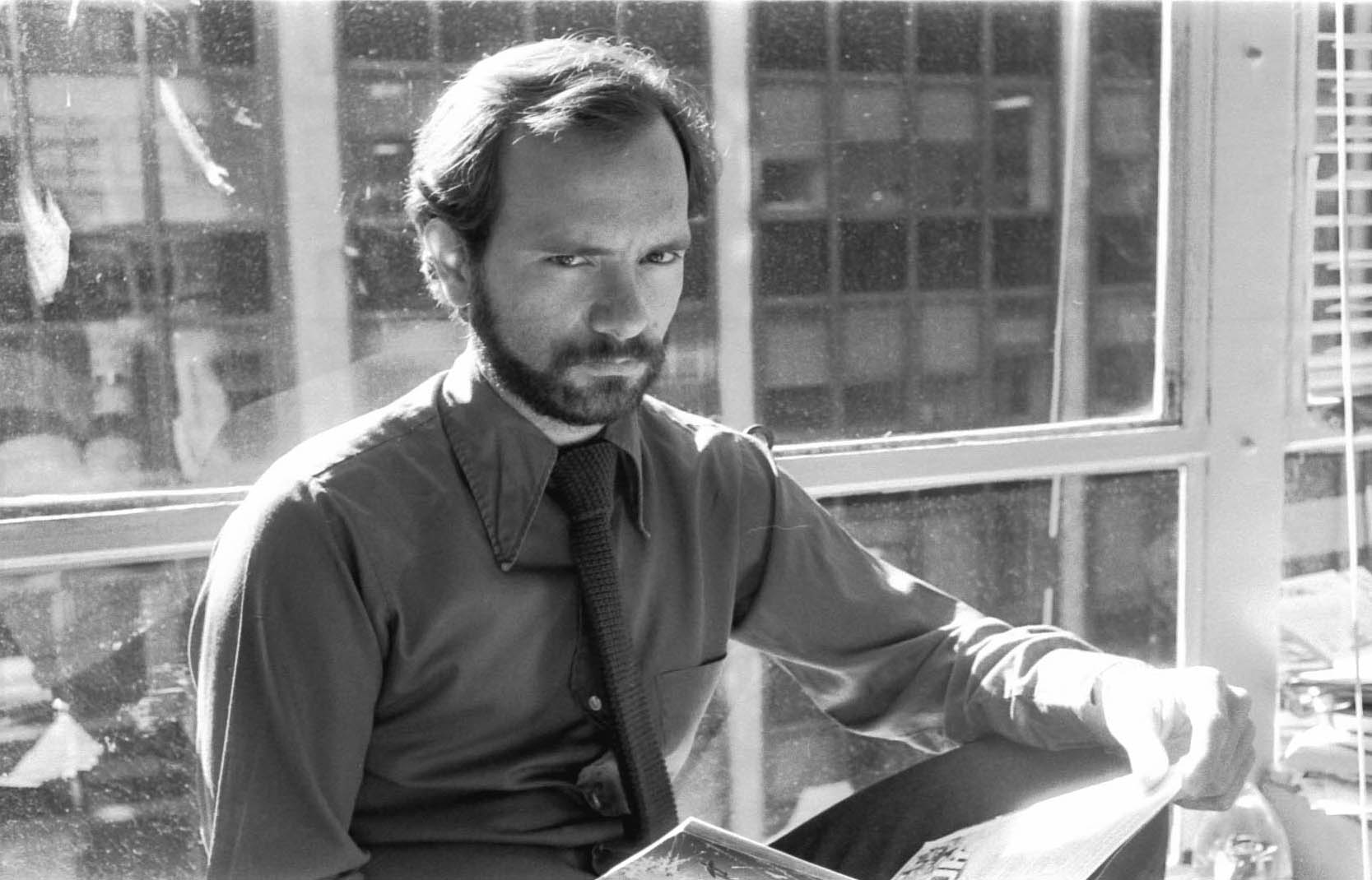 Mark Gruenwald on the 56th Street side of the Marvel editorial offices at 575 Mad. This is Ralph’s office, probably around 1982.