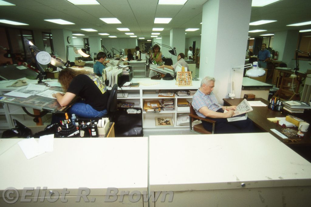 Bullpenner Production Artist Dave Sharpe and legendary inker staff Proofreader Jack Abel. Jack is proofing The Daily News.