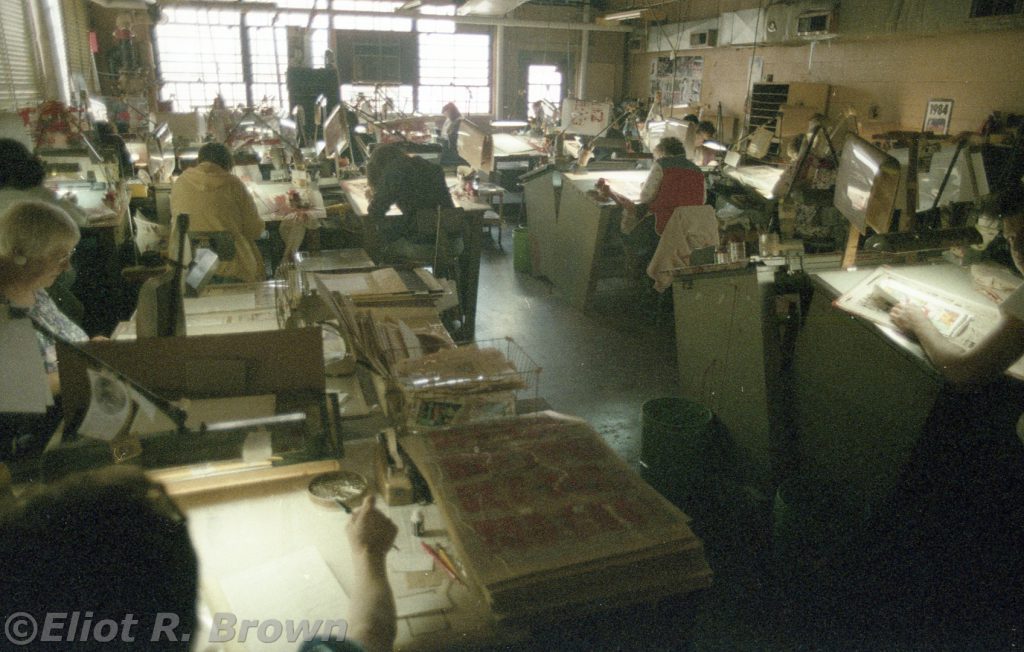 Here’s where the magic happens. Opaquing Medium is lacquer based so this room certainly smelled a bit. Mostly because one had to thin the stuff with lacquer thinner, which was a real head-spinner. It’s not immediately obvious but each of these custom-built tables is a light box. There’s top lighting as well. All of this would be right at home in a 1930 animation studio (those places work with paper originals under sheet acetate/vinyl a lot!).