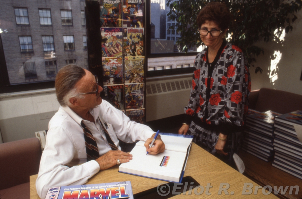 On the release of the first Marvel coffee table book Stan visits the office to sign a few. Here he signs Millie Shuriff's.