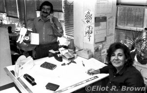 Barry worked within phone-throwing distance of Black & White Department Art Director, sweet Nora Maclin. Here’s Barry using her phone to call some freelancer to action!